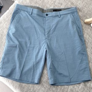 NEW - Greg Norman hold shorts